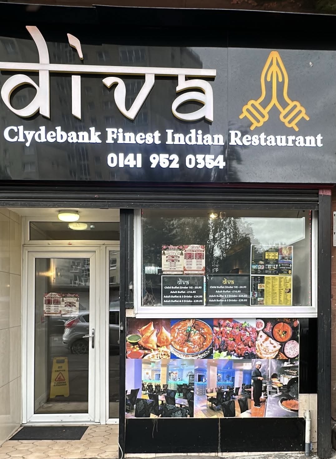 Diva's shopfront on Stewart Street: the lit diva sign over Clydebank Finest Indian Restaurant and the phone number, the front door, and a window of buffet prices and food photographs.